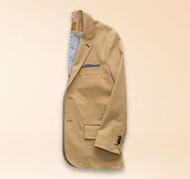 Suit Jacket In Camel photographed on a plain background