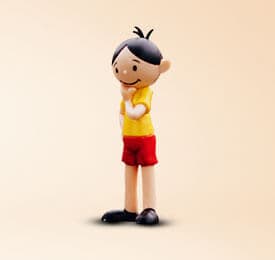 Kid Cartoon Character Toy photographed on a plain background