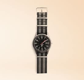 Lux Watch Leather Strap In Black photographed on a plain background
