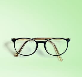 Cat-Eye Reading Glasses Look Essential photographed on a plain background