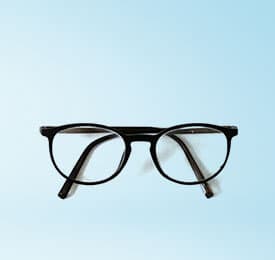 Oval Reading Glasses Look Essential photographed on a plain background