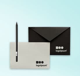 Personalized Office Envelopes And Pencil Set photographed on a plain background