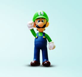 Luigi Feature Plastic Figure photographed on a plain background